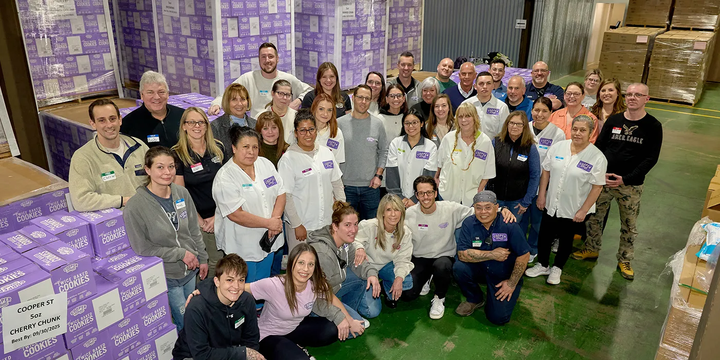 cooper street bakery team photo in the company warehouse